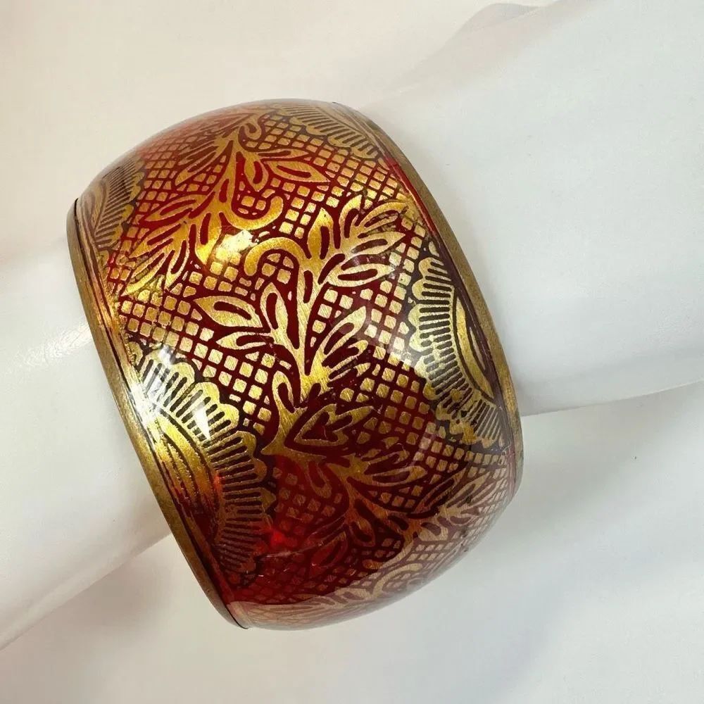 Red and gold tone wide brass bangle bracelet